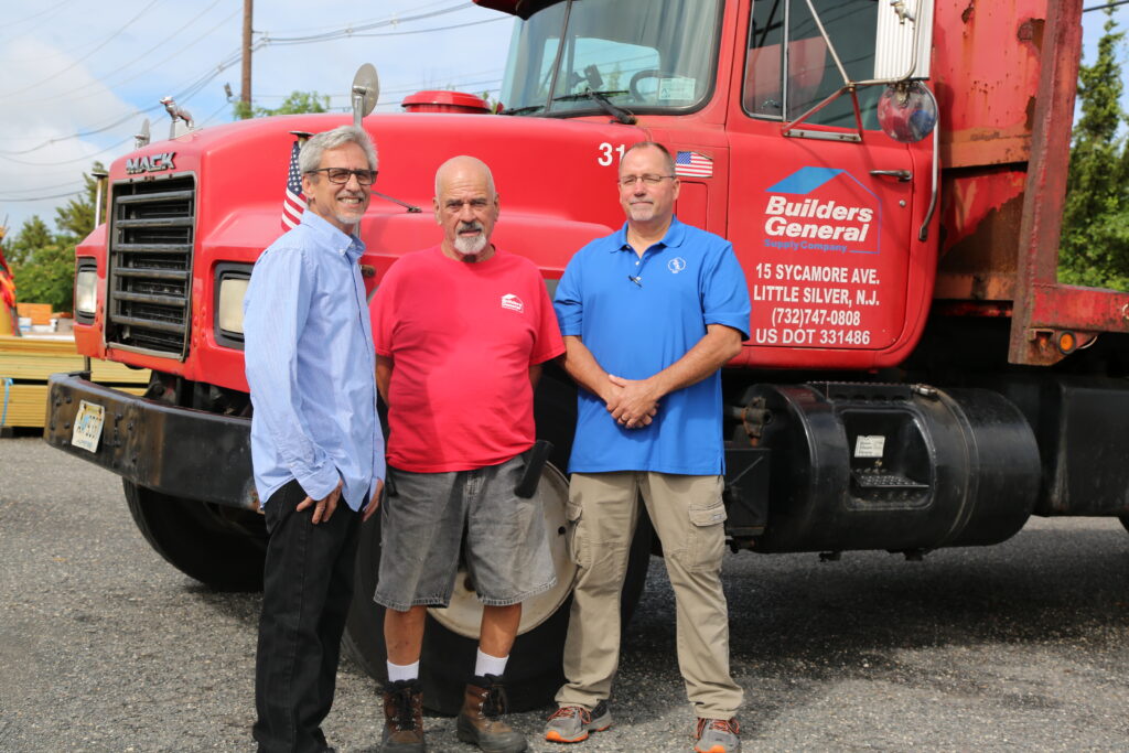 Builders' General employees standing in front of Builders’ General supply truck at our Toms River Location	Builders' General employees standing in front of Builders’ General supply truck at our Toms River Location
